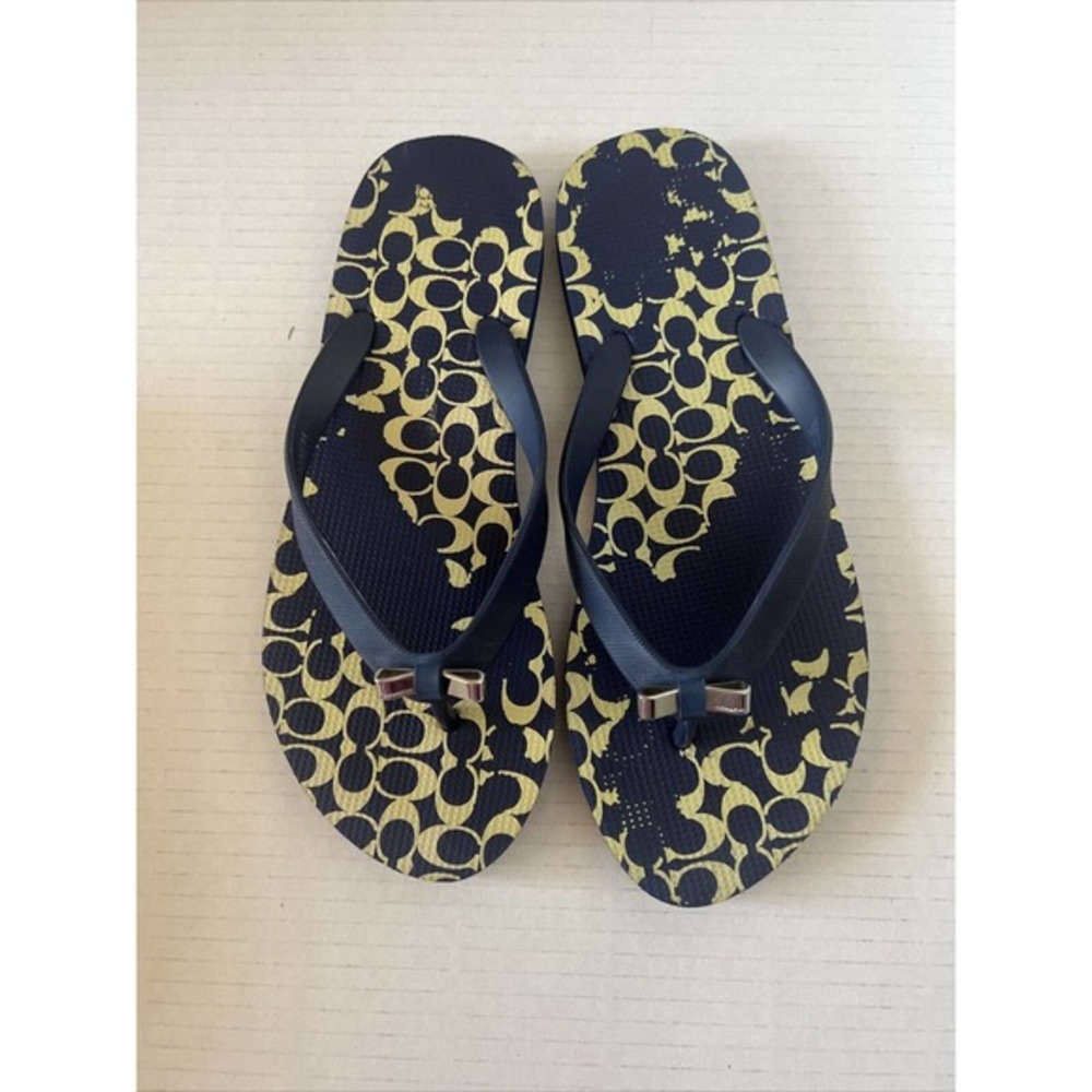 COACH Navy Flip Flop with silver tone‎ bow accent, size 7 / 8